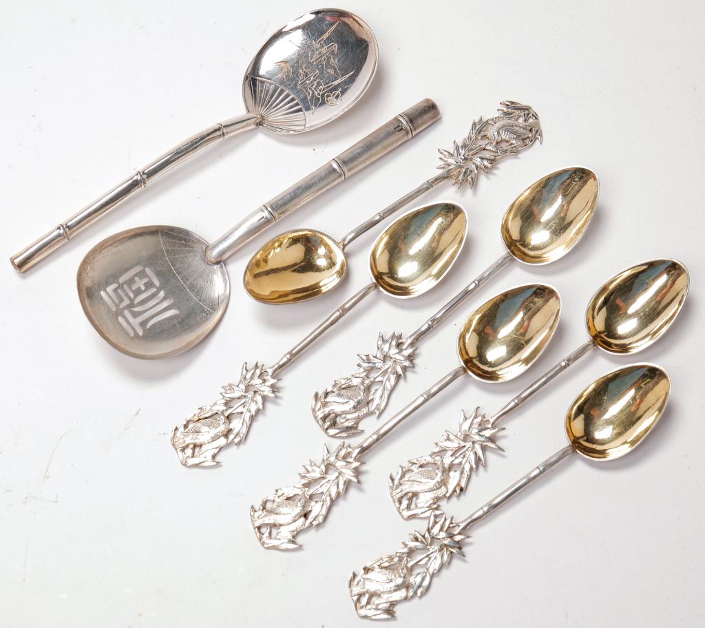 EIGHT ASIAN STERLING PIECES. (1 of 1)