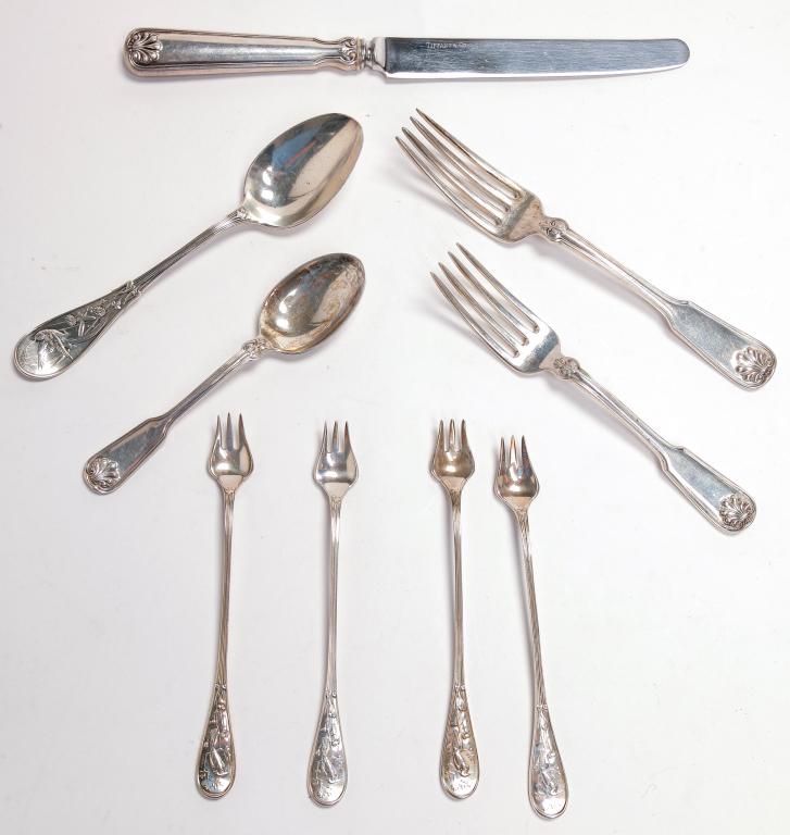 NINE PIECES OF TIFFANY STERLING FLATWARE. (1 of 1)