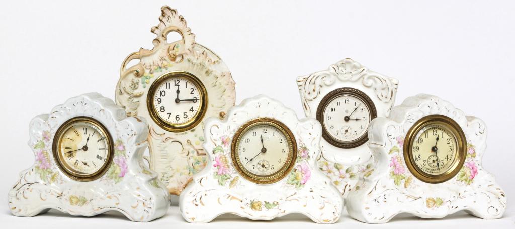 FIVE SMALL CHINA CLOCKS. (1 of 1)
