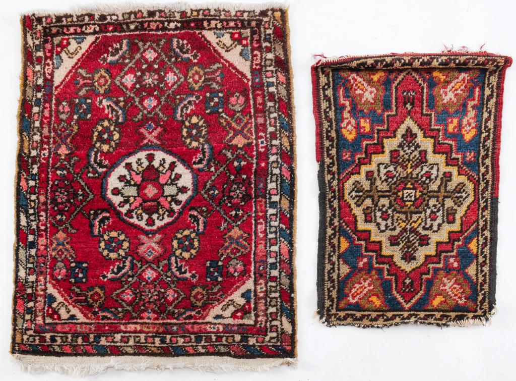 TWO ORIENTAL RUGS.: Twentieth Century. cream medallion and border with blue, rust and fan floral pattern 1'4"w. 2'1"I. And bright red with cream medallion and floral pattern. Both have some wear.