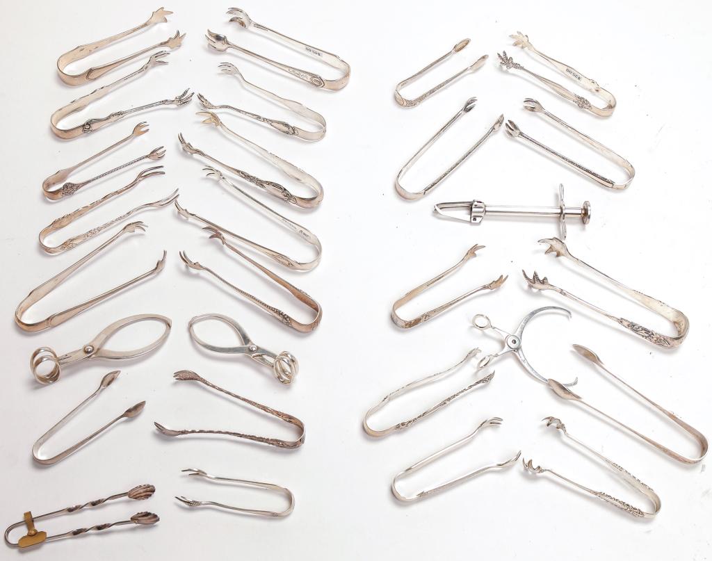GROUP OF STERLING TONGS. (1 of 1)