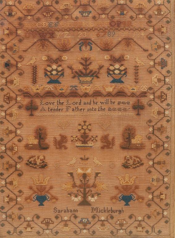 SAMPLER.: American or English, 2nd quarter 19th century. Silk and cotton on linen. Alphabet, potted flowers, floral border, squirrels, hearts and dogs with "Sarahann Mickleburgh". Stains and minor stitch loss. 