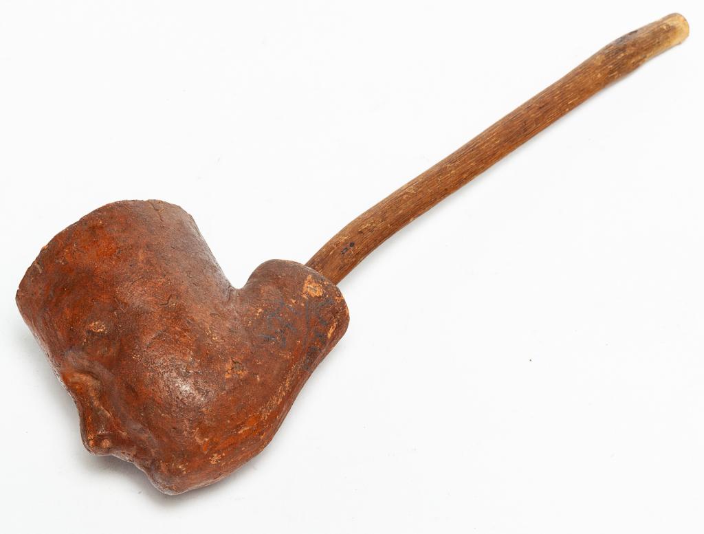 AMERICAN FOLK ART REDWARE PIPE. (1 of 3)