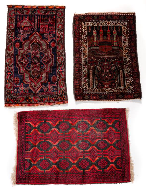 THREE ORIENTAL RUGS. (1 of 2)