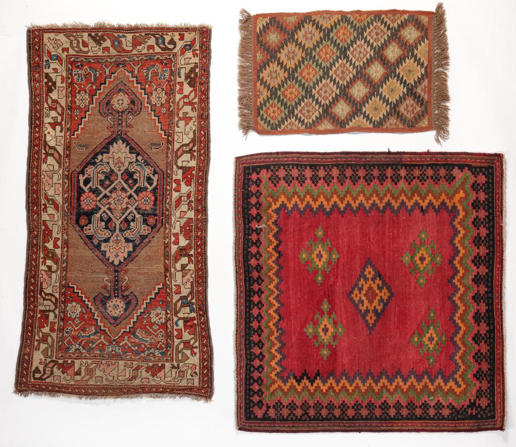 THREE ORIENTAL RUGS. (1 of 2)