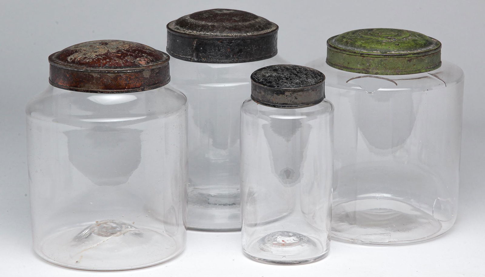 FOUR AMERICAN GLASS CONTAINERS. (1 of 5)