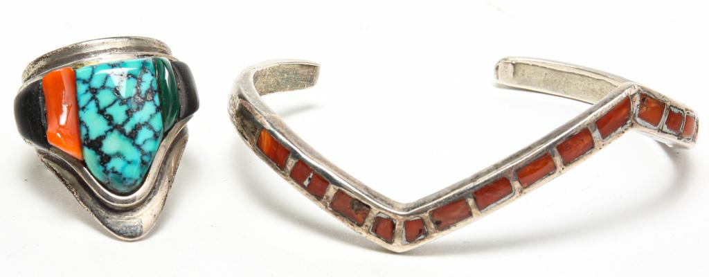 NATIVE AMERICAN STERLING RING (KIRK) AND BANGLE.: Native American, 3rd quarter - 20th century. Ladies sterling silver ring (tested), layered frame setting featuring center turquoise stone flanked by coral, malachite and jet, shank with inset bone. Si