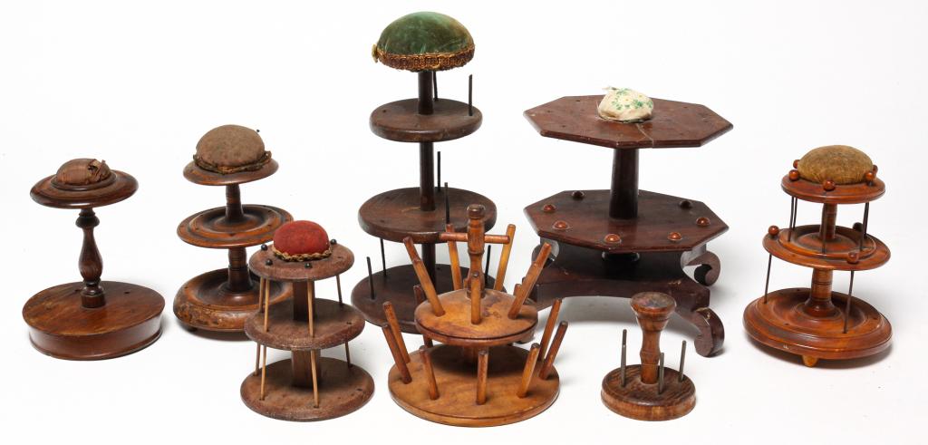 EIGHT AMERICAN SPOOL CADDIES. (1 of 5)