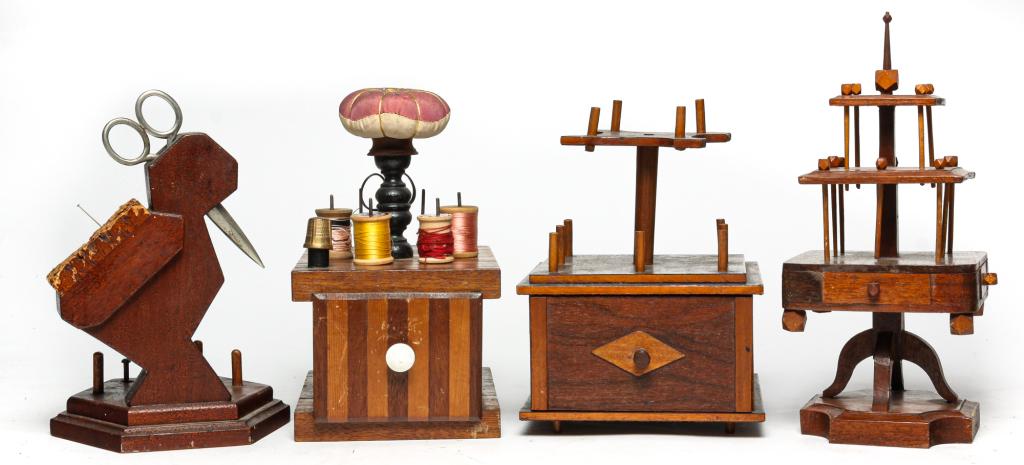 FOUR AMERICAN FOLKSY SEWING CADDIES. (1 of 4)
