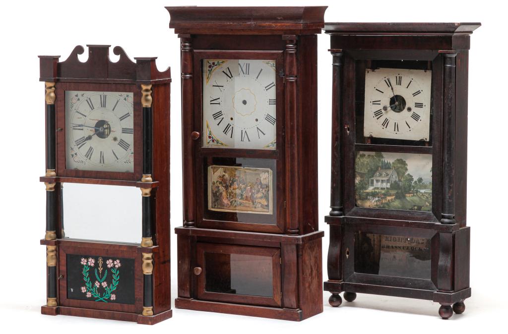 THREE AMERICAN TRIPLE DECKER CLOCKS. (1 of 8)