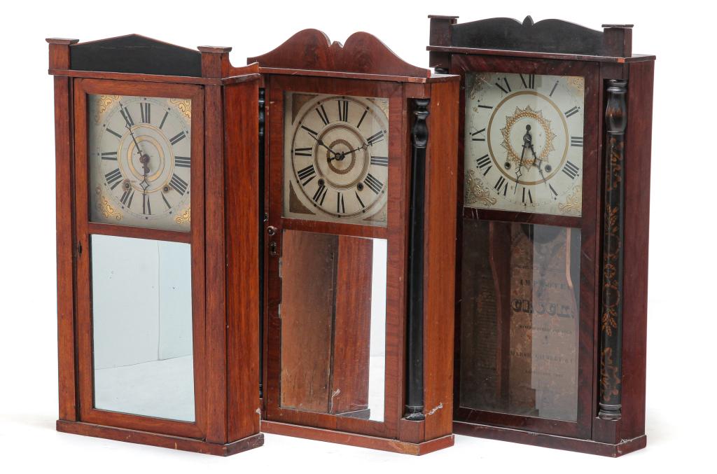 THREE AMERICAN DOUBLE DECKER CLOCKS. (1 of 5)