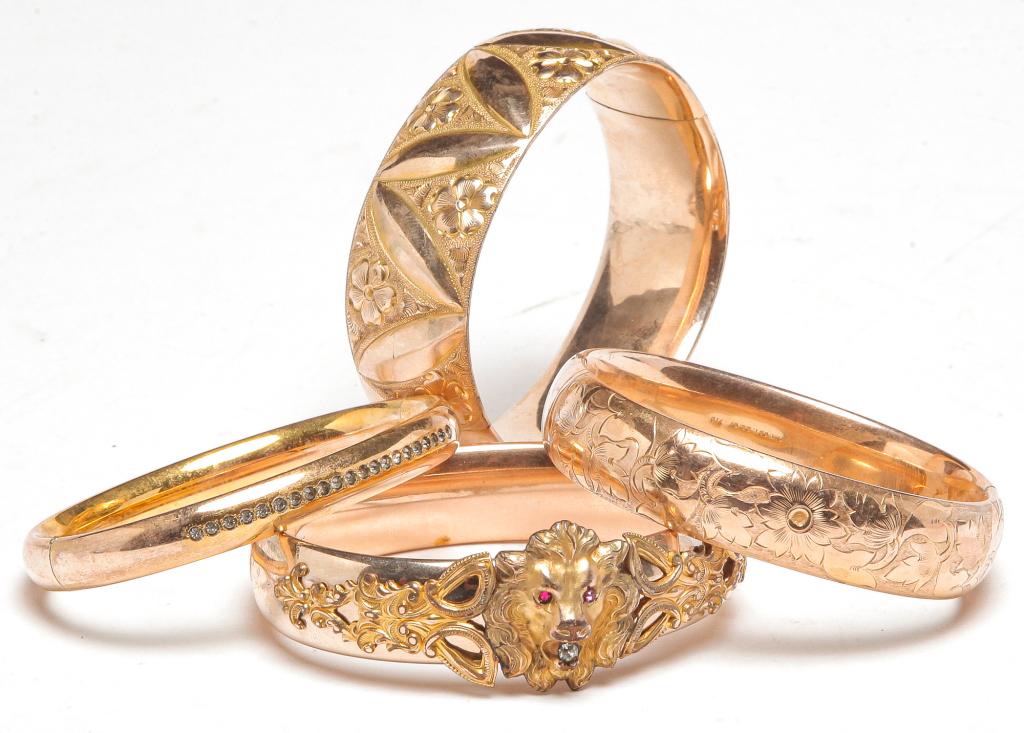 FOUR VINTAGE GOLD FILLED BANGLE BRACELETS. (1 of 5)