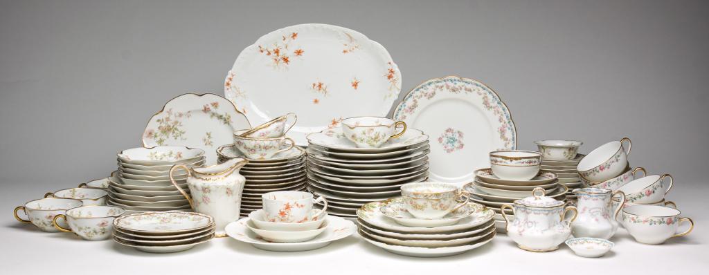SELECTION OF HAVILAND CHINA.: Ca 1900. Included are: pink roses and greenery with blue leaf brackets, blue floral border and garlands of pink flowers, orange flowers with pale green stems, pink roses in garlands, pale coral flower