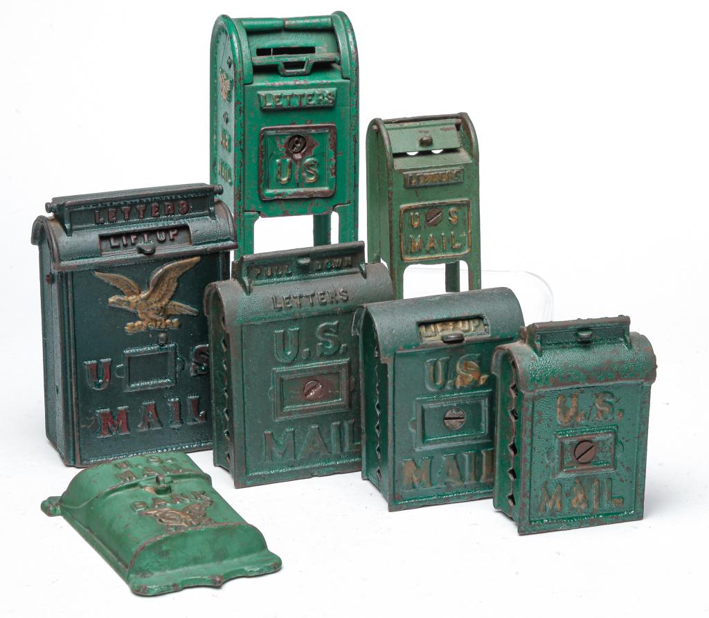 SEVEN CAST IRON MAIL BOX BANKS. (1 of 3)