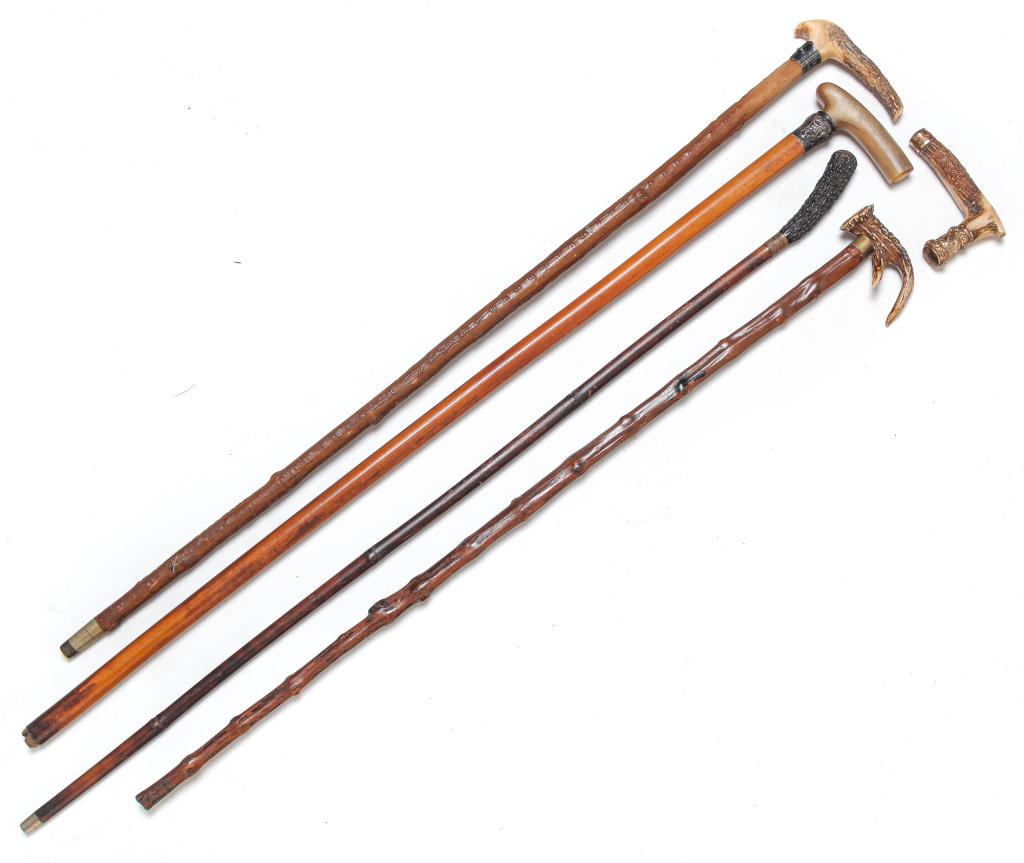 FIVE PIECES: FOUR CANES AND ONE HANDLE. (1 of 3)