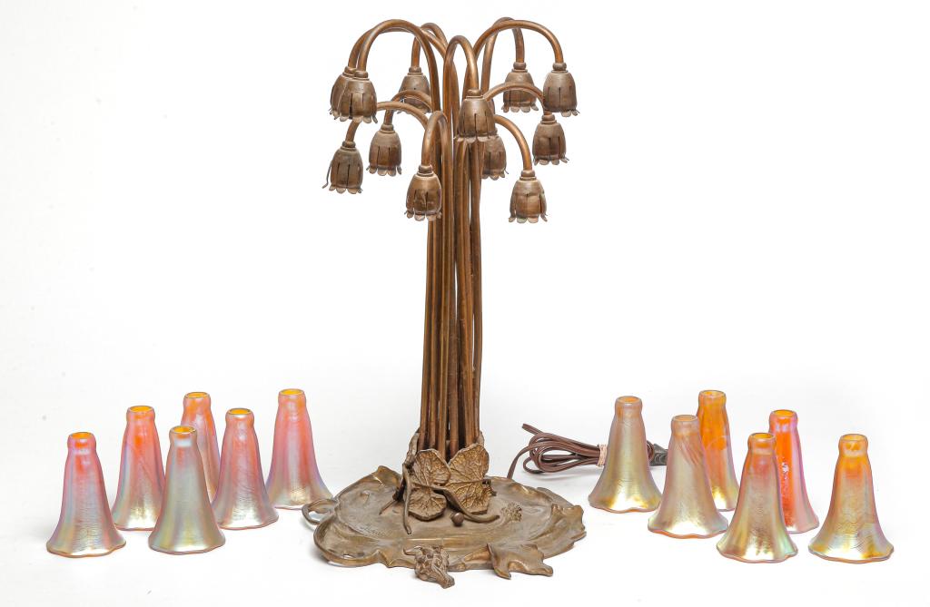 F. MADURELL BRONZE LAMP WITH LOTTON SHADES.: Twentieth century. Twelve-light bronze base with foliate detail, signed F. Madurell and has indistinct foundry mark. 19.75"h. And twelve gold iridized shades signed "Lotton" and dated 1979, 4"h. 3"d.