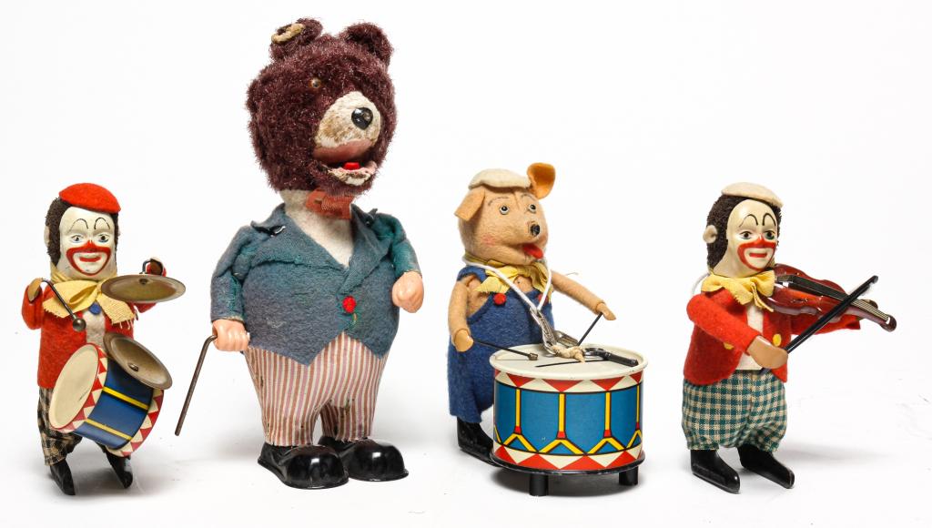 FOUR WINDUP TOYS. (1 of 4)