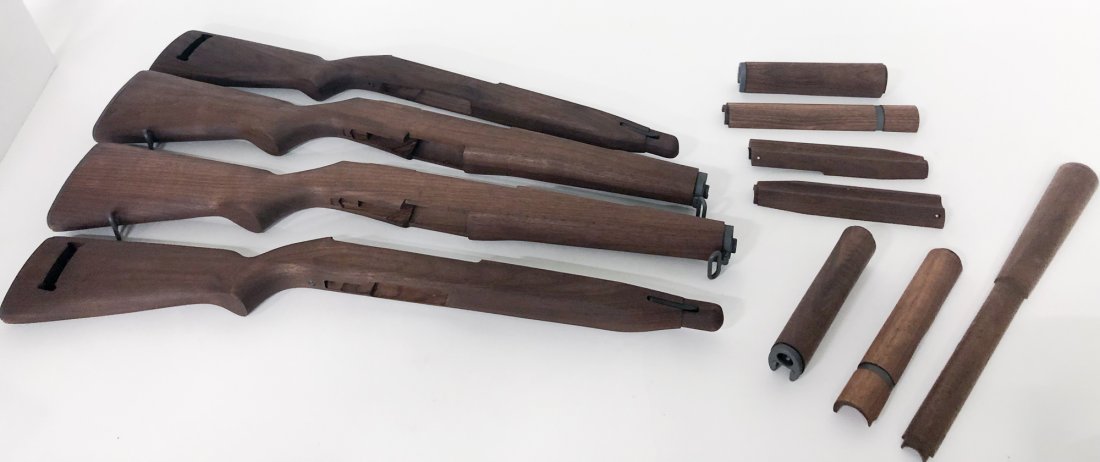TWO RIFLE STOCKS AND TWO CARBINE GUN STOCKS: Two rifle stocks, stamped "Civilian Marksman Program". Together with two Carbine stocks, stamped "CMP".
