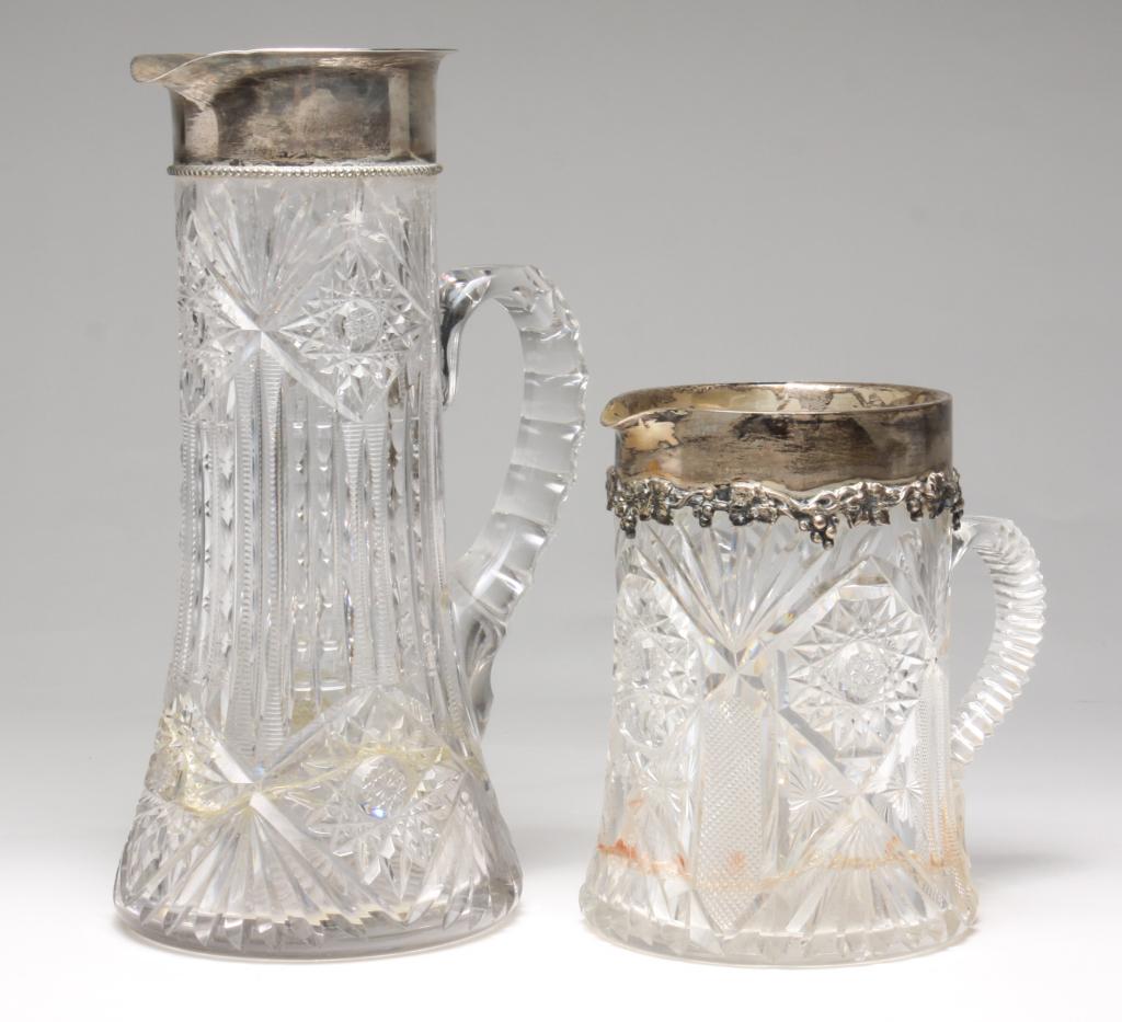 TWO AMERICAN CUT GLASS AND "STERLING" PITCHERS. (1 of 5)