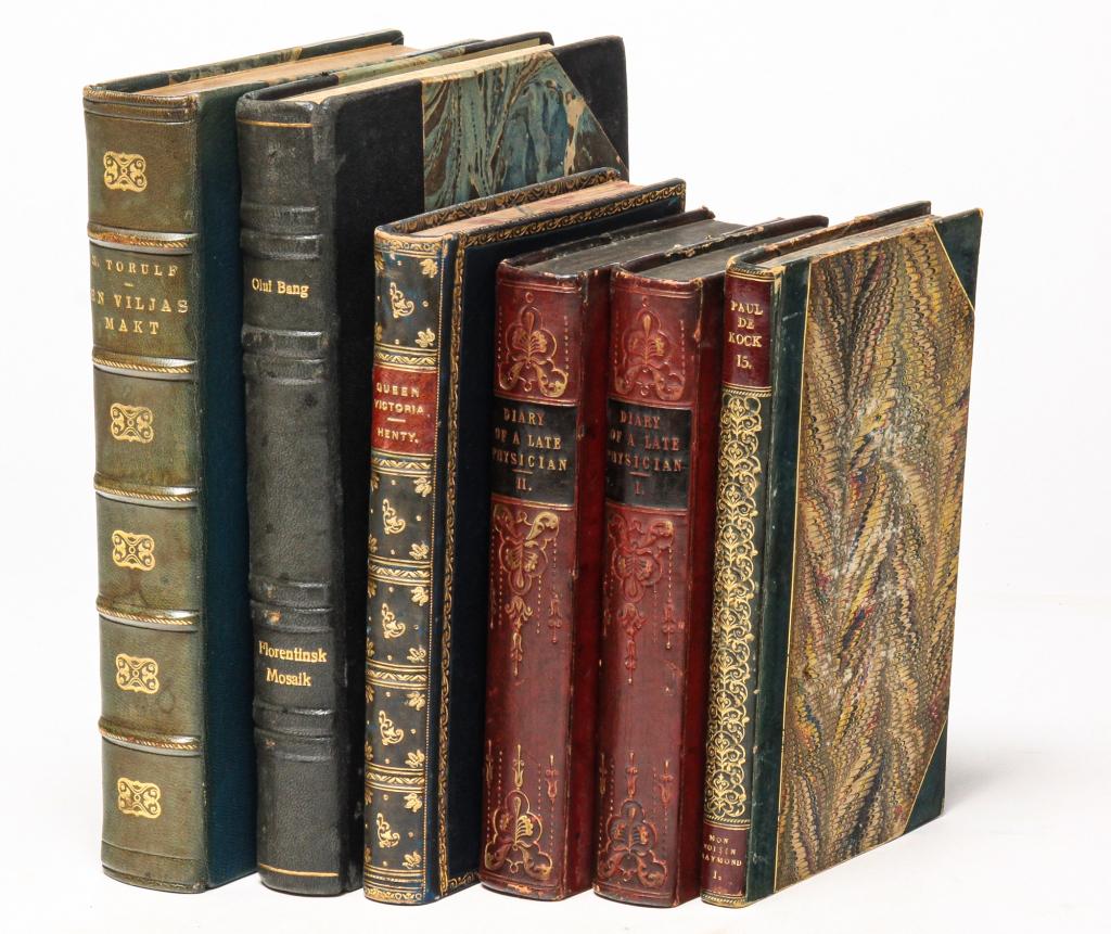 SIX LEATHER BOUND BOOKS. (1 of 9)