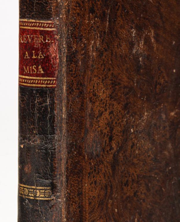 DR. JOAQUIN LORNEZO VILLANUEVA BOOK ON MASS.: "De la reverencia con que se debe asistir a la misa..." published in Madrid, 1791. Printed in Spanish with a pen and ink notation inside the front cover. Leather bound. Some wear and toning.