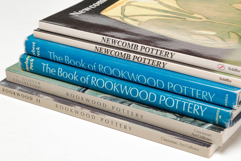 SIX BOOKS ON ROOKWOOD AND NEWCOMB POTTERY.: Twentieth century. Two copies each "The Book of Rookwood Pottery" by Herbert Peck (hardcover), 1968 and "Newcomb Pottery" by Jessie Poesch (paperback), 1984. Together with two paperback Rookwood catal