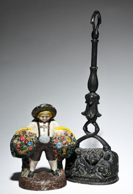 TWO AMERICAN DOOR STOPS. (1 of 4)