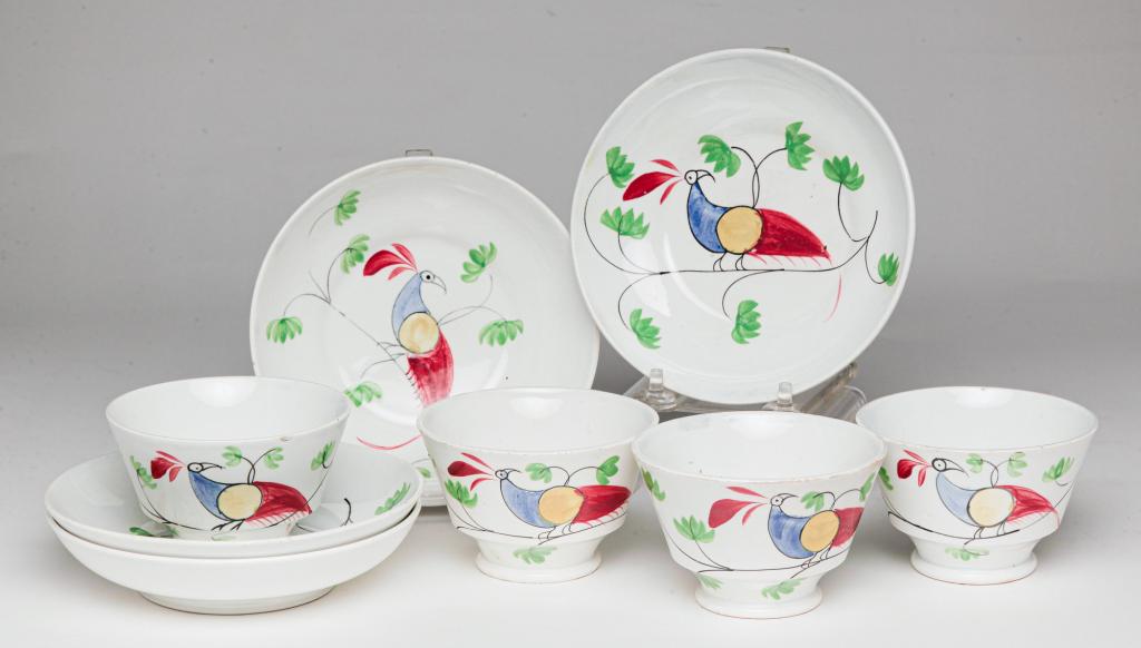 FOUR ENGLISH PEAFOWL CUPS AND SAUCERS. (1 of 3)