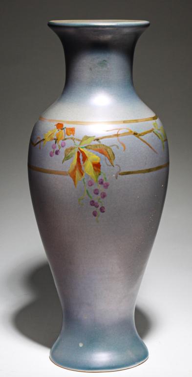 ROSEVILLE PAULEO VASE.: Ca. 1914. Metallic grey-blue body with grape decoration, unmarked, 17"h.