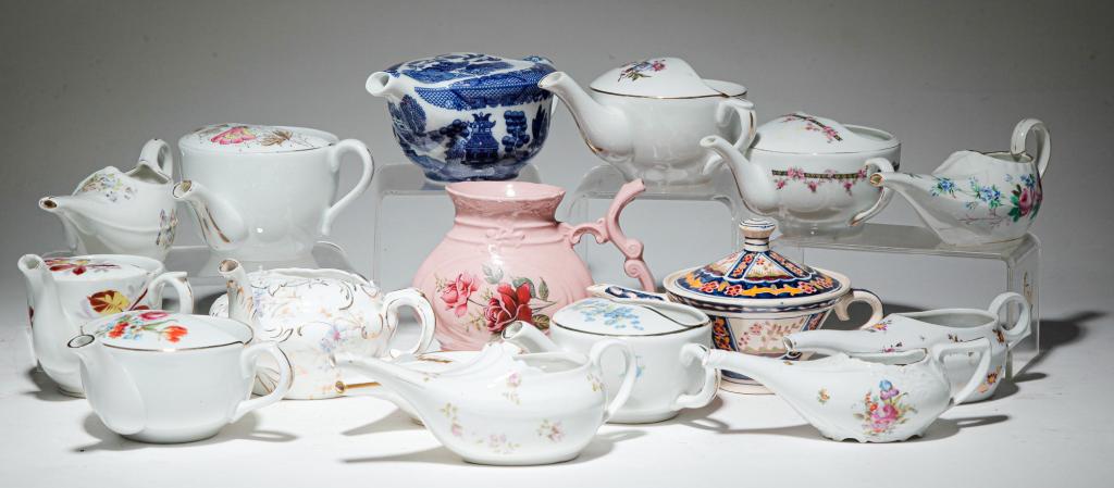 GROUP OF INVALID FEEDERS.: Nineteenth and 20th centuries. Mostly German with flora and gold band decoration in porcelain and earthenware.