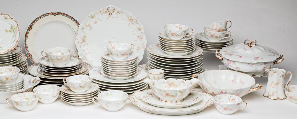 SELECTION OF HAVILAND CHINA.: Ca. 1900. Including pink flowers with blue ribbons, ivory and floral border, pink and lavender flowers and multicolored branches of flowers.