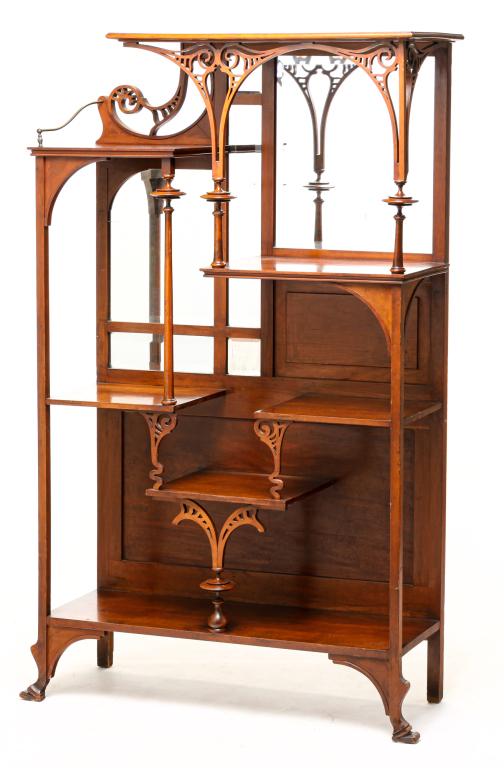 AMERICAN EASTLAKE ETAGERE.: Fourth quarter 19th century, southern gum. Irregularly-spaced shelves, turned supports, jig-saw cut decoration and shaped legs with beveled mirrors in back. Missing crest, refinished. 61"h. 38.5"w. 13
