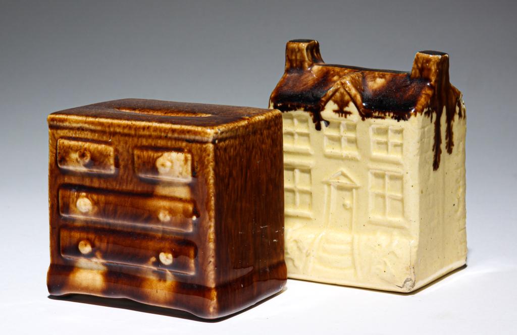 TWO POTTERY BUILDING BANKS. (1 of 3)