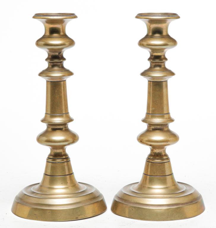 PAIR OF AMERICAN BRASS CANDLE STICKS. (1 of 1)