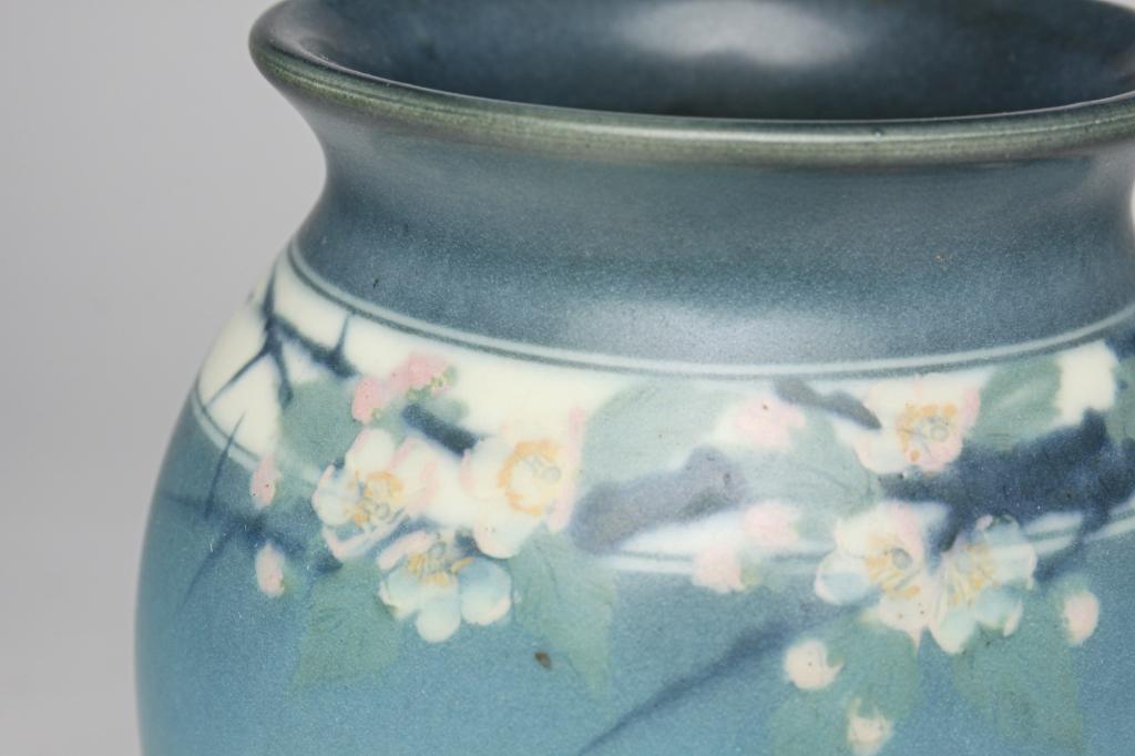ROOKWOOD VELLUM VASE BY E.T. HURLEY.: Dated 1926. Shape 363 with cherry blossom band on shaded blue-grey background. 6.25"h.