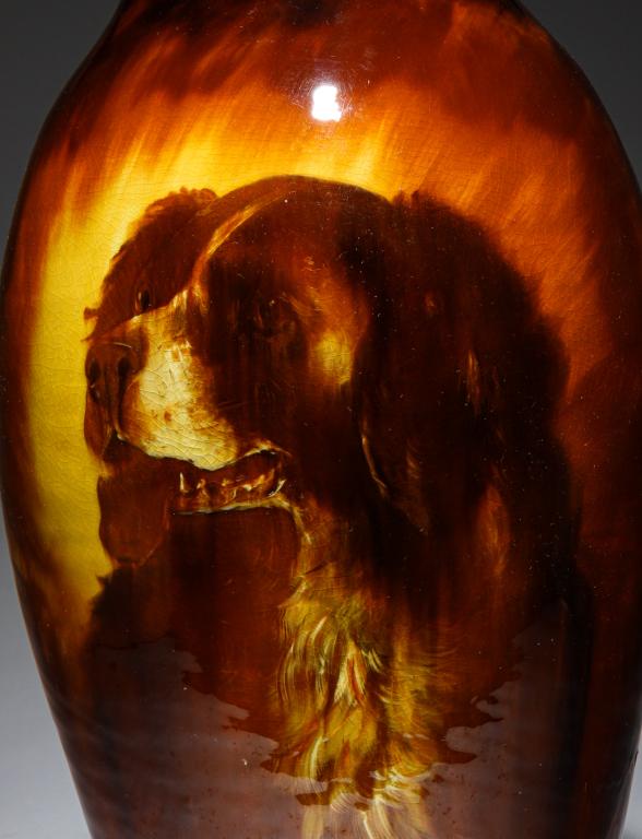 RADFORD GARDRUH VASE BY ALBERT HAUBRICH.: Twentieth century. High brown underglaze with Springer Spaniel portrait. Drilled for lamp. 15.5"h.