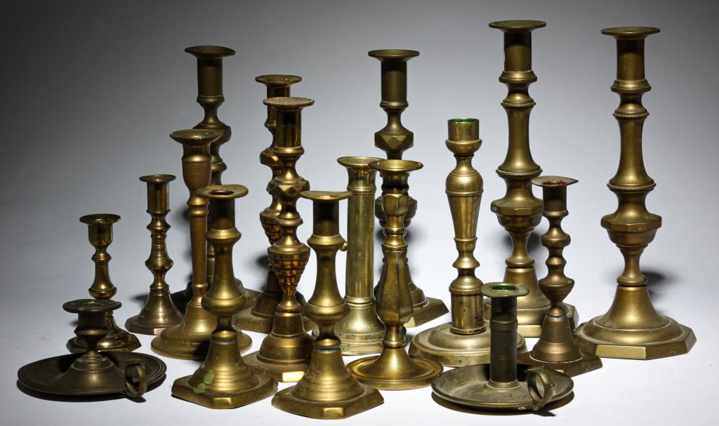 GROUP OF BRASS CANDLE HOLDERS. (1 of 5)
