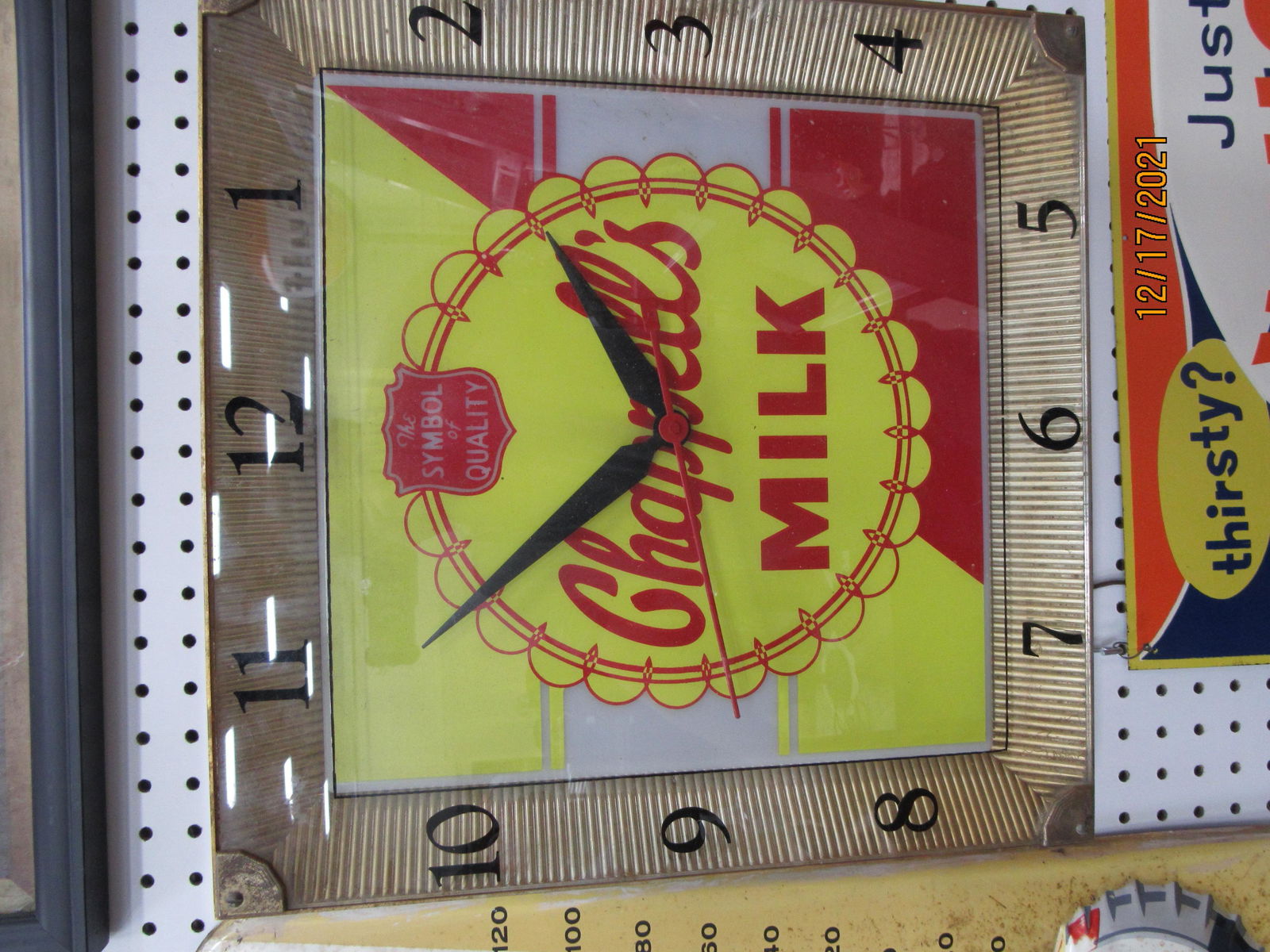 CHAPPELL'S MILK CLOCK: Mid 20th Century. Metal and plastic, working, some wear 16"H x 16"W