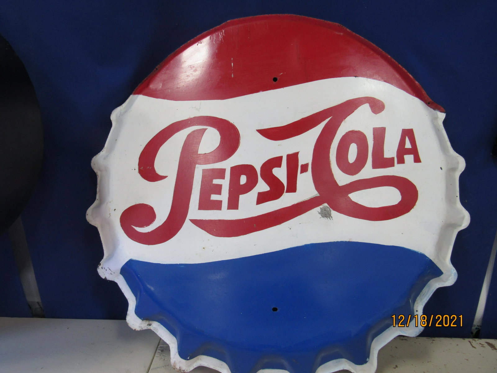 ORIGINAL PEPSI COLA BUTTON: First half 20th Century. Metal die cast, repaint. Sum chips and rust 30” dia