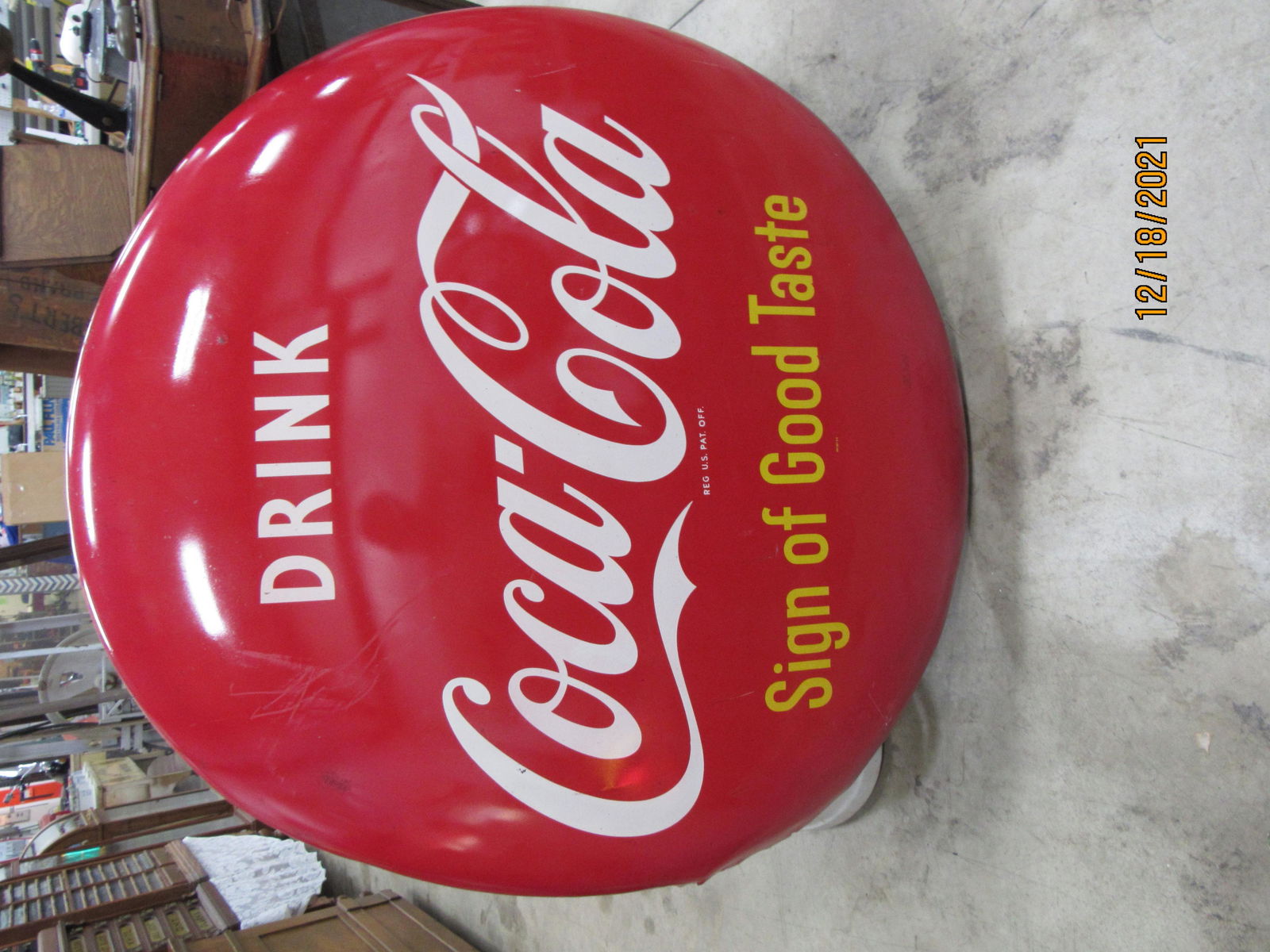PORCELAIN COCA-COLA BUTTON SIGN (1 of 2)