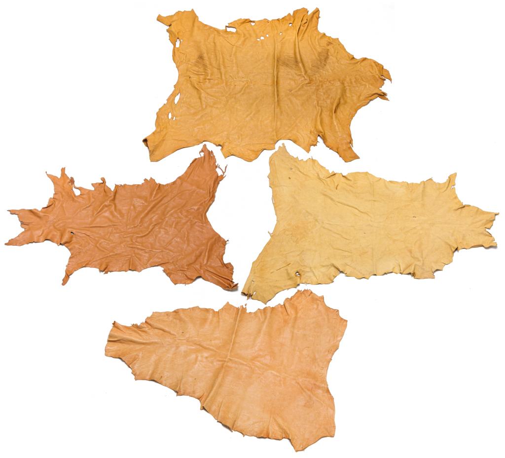 FOUR TANNED HIDES.: Second half 20th century. Largest 48" x 80", others average 30" x 48".