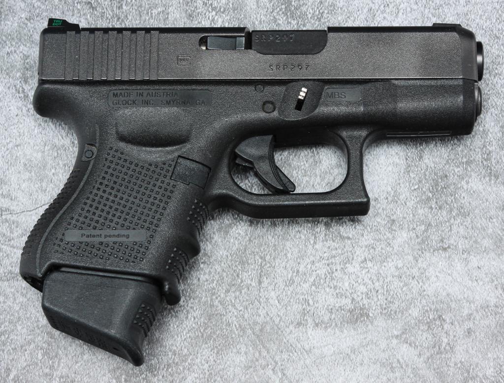 *GLOCK MODEL 26 GEN 4 9MM SEMI-AUTO PISTOL.: Glock model 26 Gen 4 9mm semi-automatic pistol. Textured grips with 3.5" barrel, 6.25" overall. Includes original case, paperwork, lock, and six clips. Serial number SRP297. Requires ATF form 4473.