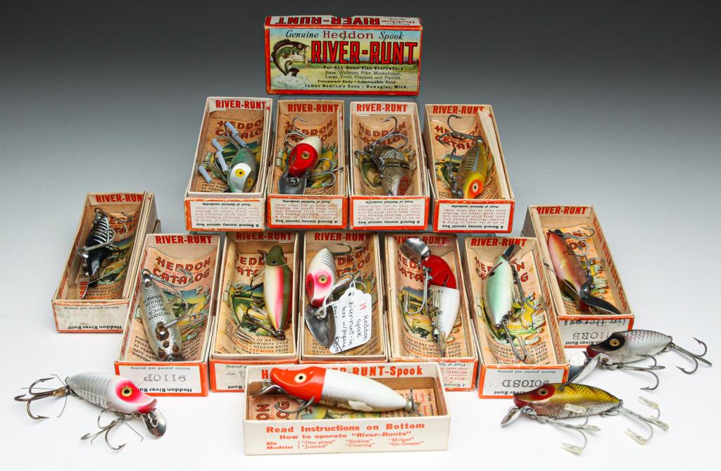 FIFTEEN HEDDON RIVER RUNT SPOOK FISHING LURES.: Group of fifteen Heddon River-Runt spook fishing lures. Includes floaters, sinkers, go-deeper, and jointed lures. All are in original boxes, some with paper inserts.