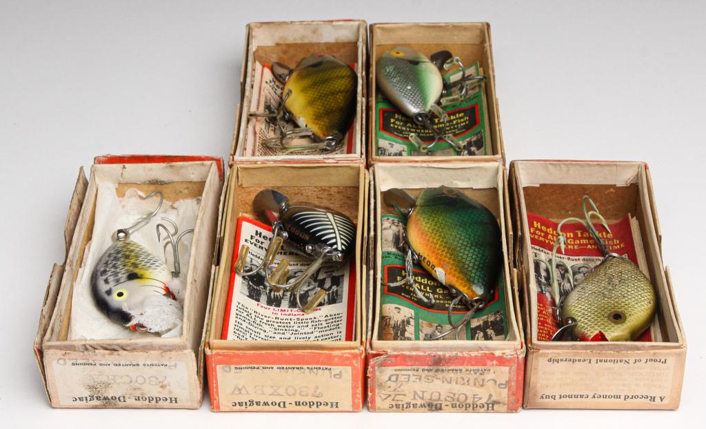 SIX HEDDON PUNKIN-SEED LURES IN ORIGINAL BOXES.: Group of six Heddon Punkin-seed lures. American, first half 20th century. All in original boxes, most with paper inserts.