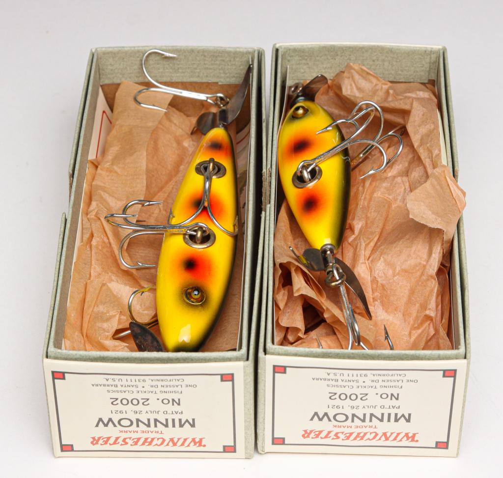 TWO WINCHESTER BAIT MINNOW LURES, BOXES & INSERTS.: Two Winchester Bait Minnow lures. Includes two No. 2002 lures, one with three hooks and one with five hooks. Both in original boxes with wrapping and paper inserts.