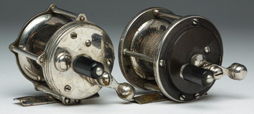 TWO "JULIUS VOM HOFE" FISHING REEL.: American, late 19th-early 20th century. Patent dates "Oct. 8, '89". Raised pillar, and bakelite (?) panels marked "Quadruple". Some wear and scratches from use.