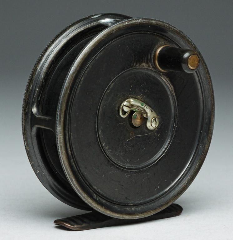 ENGLISH HARDY BROS. "UNIQUA" FLY REEL.: First quarter 20th century. "Made by Hardy BRos. Ltd. Alnwick, England Size 3 1/8". The Uniqua Fly Reel, Duplicated Mark II". Wear from use.