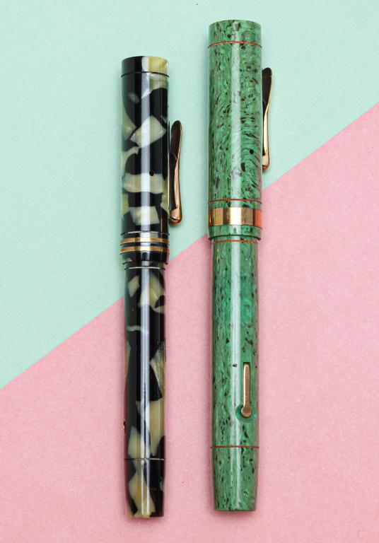 TWO CONKLIN ENDURA FOUNTAIN PENS.: First half - 20th century. Both pens stamped on lever 'PAT NOV17.1925' with embossed crescent, clear barrel imprints. One Conklin pastel lime green Endura large flat top fountain pen, Endura nib. Red 