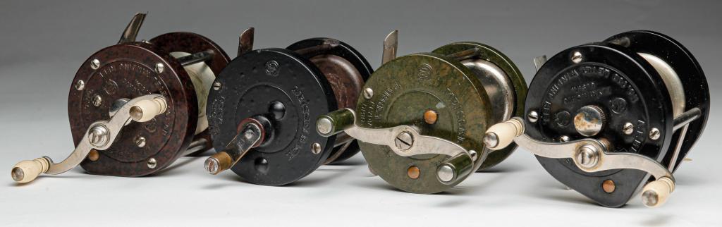 FOUR BAKELITE "MEISSELBACH" BAIT CASTING REELS.: Ohio, 2nd quarter 20th century. Two No. 100 Level Winding Reels and a single with maker's mark only. Some edge damage. Together with a green "Target Reel". Minor wear and scratches overall.