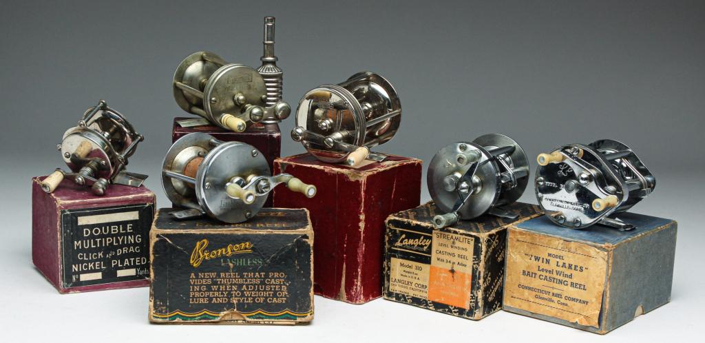 SIX AMERICAN FISHING REELS WITH BOXES.: Mid 20th century. "Bronson Lashless" with booklet, "H-I" in a Langley box, Connecticut Reel Co. "Twin Lakes Model 62", "HBS & Co. Rev-o-noc Tournament" (Hibbard, Spencer, Bartle & Co.) with oil can, F